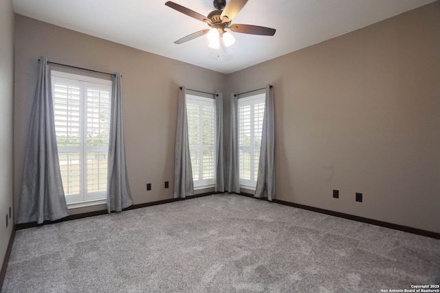1181 County Road 4516, Castroville, TX 78009 - carpeted spare room with plenty of natural light, a ceiling fan, and baseboards
