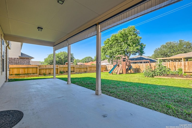 view of patio featuring a playground
