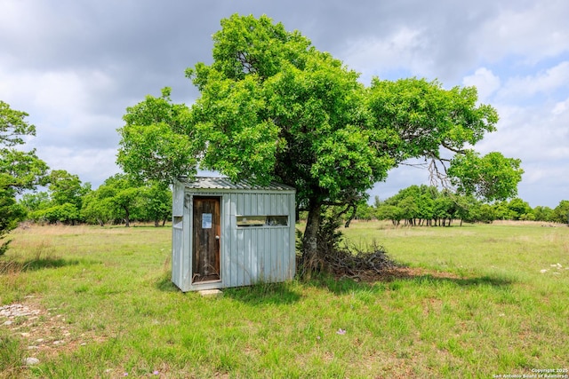 2050 Adj Ln, Fredericksburg, TX 78624 - view of green lawn featuring a shed and an outdoor structure
