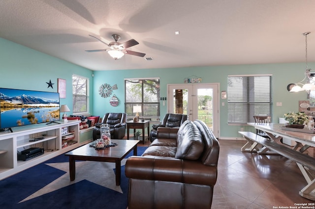 315 E Klein, New Braunfels, TX 78130 - living room with ceiling fan, tile patterned floors, french doors, and baseboards
