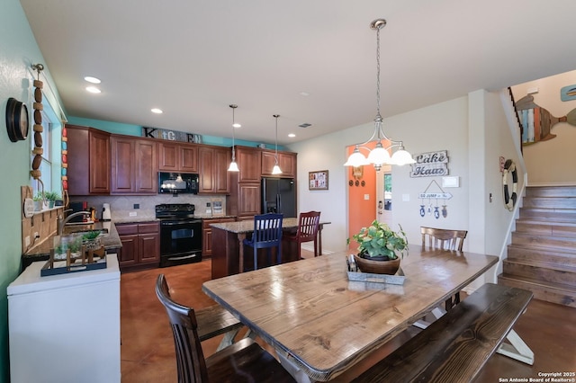 315 E Klein, New Braunfels, TX 78130 - dining space with recessed lighting, stairway, and a chandelier