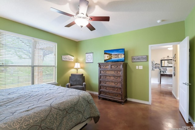 315 E Klein, New Braunfels, TX 78130 - bedroom with baseboards and ceiling fan