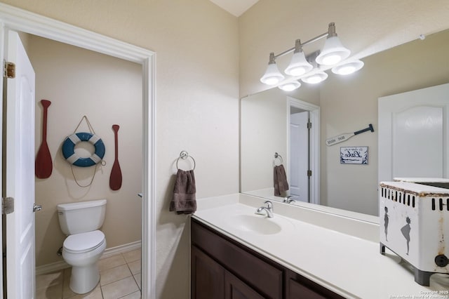 315 E Klein, New Braunfels, TX 78130 - bathroom with toilet, tile patterned floors, vanity, and baseboards