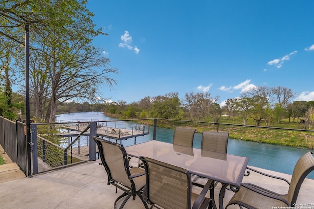 315 E Klein, New Braunfels, TX 78130 - view of patio / terrace with a water view and outdoor dining space