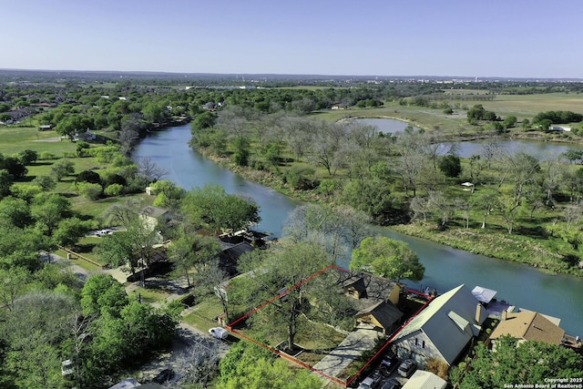 315 E Klein, New Braunfels, TX 78130 - aerial view of property and surrounding area featuring a large body of water and property boundaries highlighted