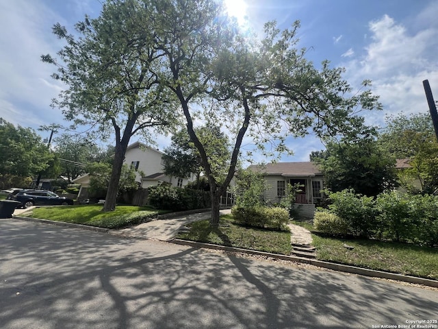210 Harrison, Alamo Heights, TX 78209 - obstructed view of property featuring driveway