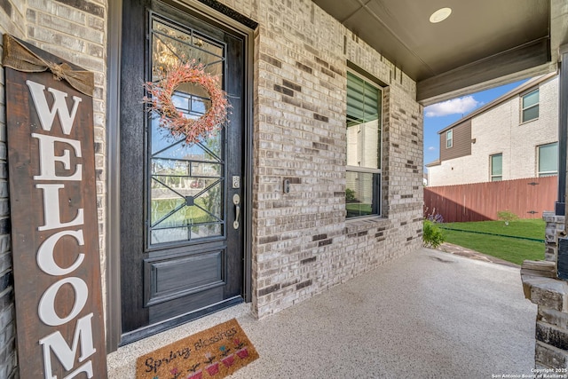 11109 Molly Run, San Antonio, TX 78254 - property entrance featuring brick siding, fence, and covered porch