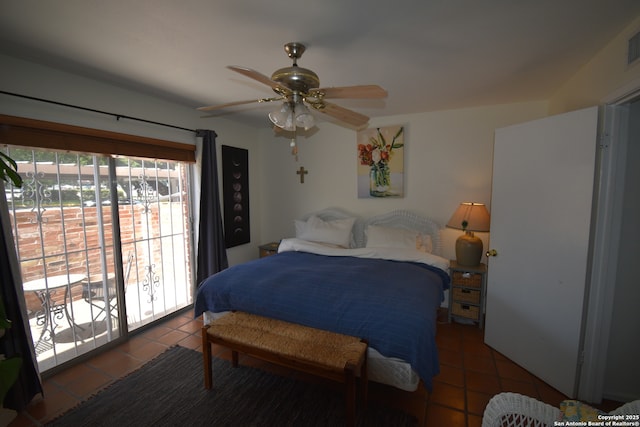 8401 New Braunfels Unit 125, San Antonio, TX 78209 - bedroom featuring tile patterned flooring and a ceiling fan