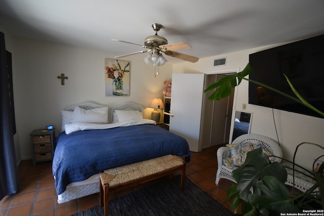 8401 New Braunfels Unit 125, San Antonio, TX 78209 - tiled bedroom featuring a ceiling fan