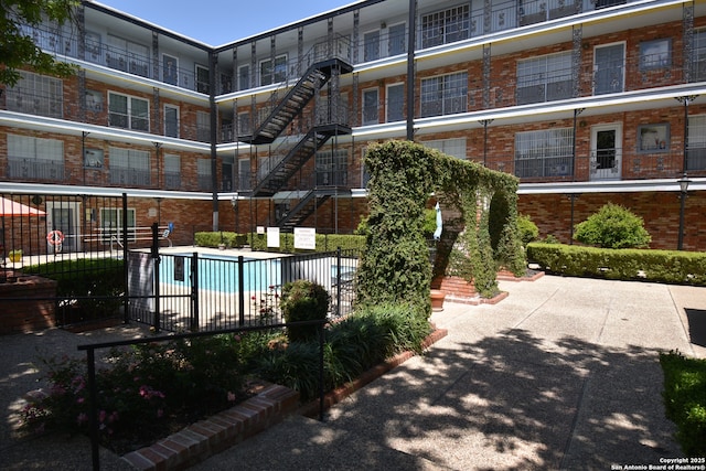 8401 New Braunfels Unit 125, San Antonio, TX 78209 - community pool featuring fence