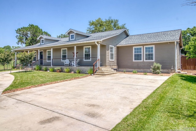 296 Cherokee Dr, Bandera, TX 78003 - view of front of property with a front lawn and a porch