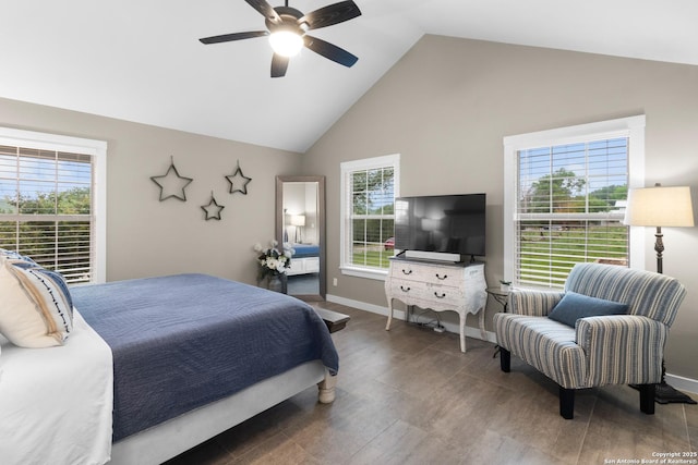 296 Cherokee Dr, Bandera, TX 78003 - bedroom with high vaulted ceiling, multiple windows, baseboards, and ceiling fan