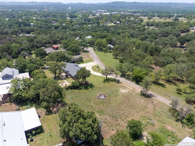 296 Cherokee Dr, Bandera, TX 78003 - drone / aerial view of a mountain backdrop