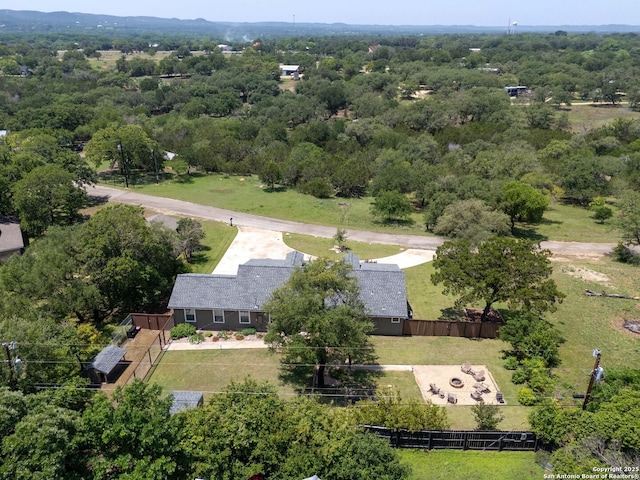 296 Cherokee Dr, Bandera, TX 78003 - aerial view of a heavily wooded area