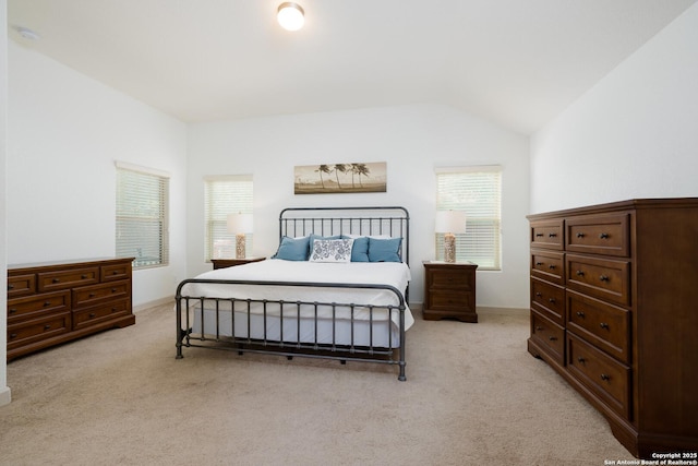 1041 Water Oak, Schertz, TX 78154 - bedroom featuring light colored carpet, multiple windows, vaulted ceiling, and baseboards