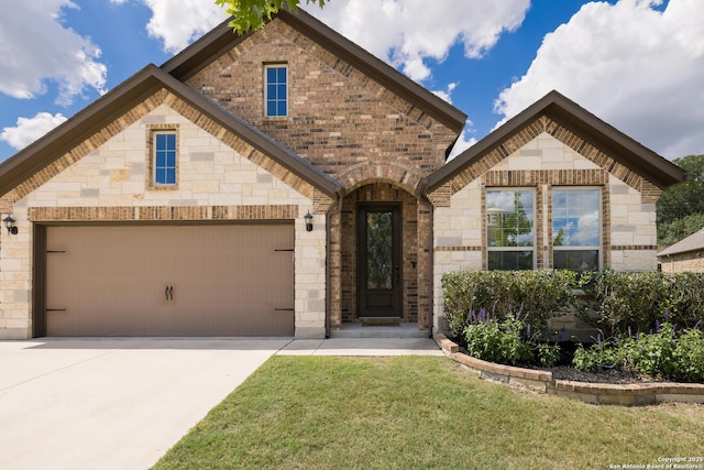 1041 Water Oak, Schertz, TX 78154 - view of front of property with brick siding, driveway, a front lawn, and stone siding