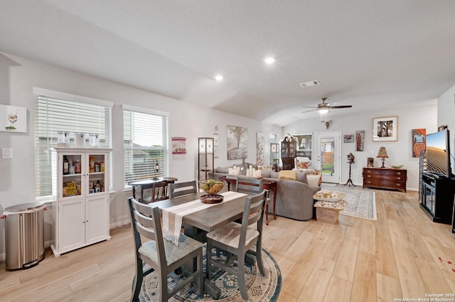 10227 Azealia Way, Boerne, TX 78006 - dining area featuring a ceiling fan, light wood finished floors, lofted ceiling, and recessed lighting