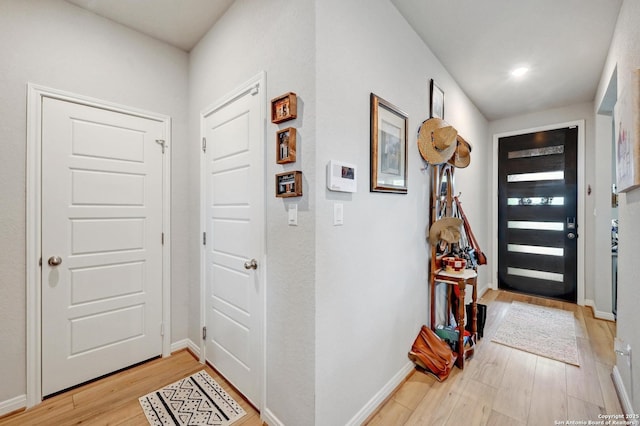 10227 Azealia Way, Boerne, TX 78006 - entrance foyer featuring light wood-style floors, baseboards, and recessed lighting