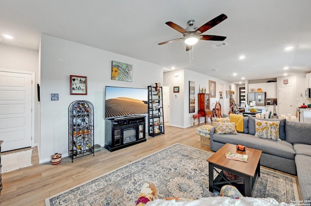10227 Azealia Way, Boerne, TX 78006 - living room with a ceiling fan, light wood-style flooring, baseboards, and recessed lighting