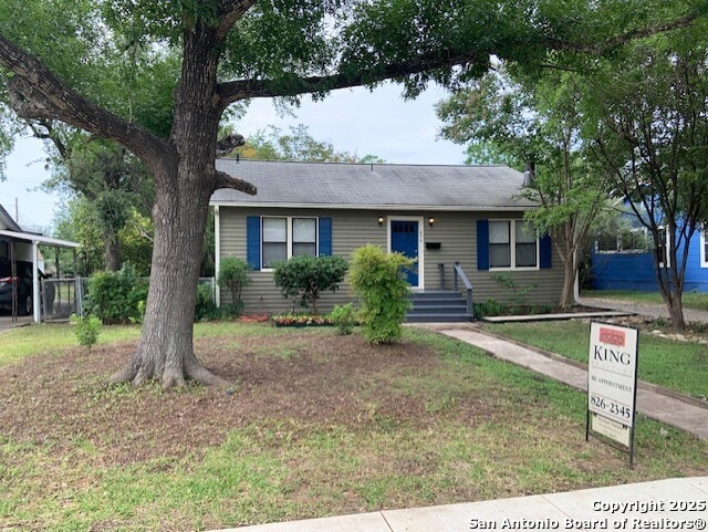 434 Hermine, San Antonio, TX 78212 - view of front facade featuring a front lawn