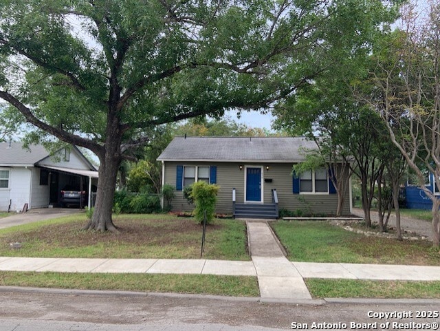 434 Hermine, San Antonio, TX 78212 - single story home with an attached carport, a front lawn, and concrete driveway