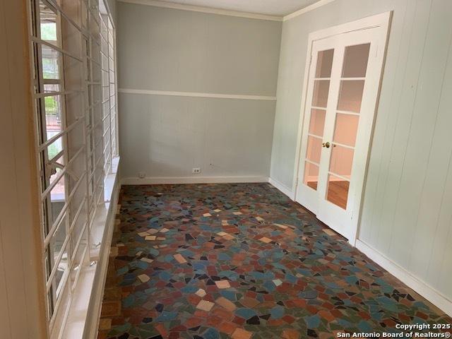 434 Hermine, San Antonio, TX 78212 - unfurnished room with french doors, baseboards, and crown molding