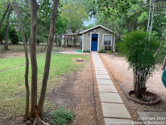 434 Hermine, San Antonio, TX 78212 - view of front facade featuring a front lawn and an outdoor structure