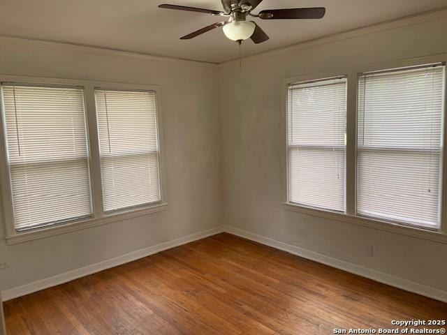 434 Hermine, San Antonio, TX 78212 - unfurnished room with light wood finished floors, baseboards, crown molding, a ceiling fan, and plenty of natural light