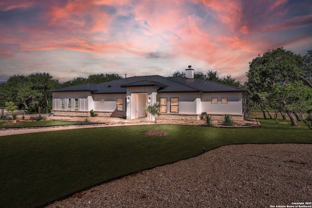740 Sharp Spgs, Bulverde, TX 78163 - view of front of house with a chimney, metal roof, a standing seam roof, and a front yard