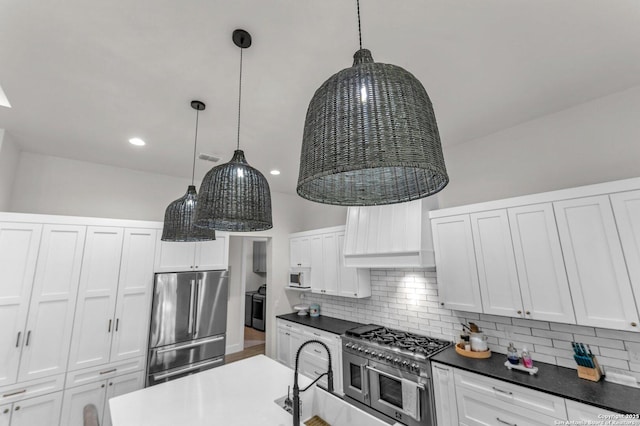 740 Sharp Spgs, Bulverde, TX 78163 - kitchen with appliances with stainless steel finishes, decorative backsplash, white cabinetry, premium range hood, and pendant lighting