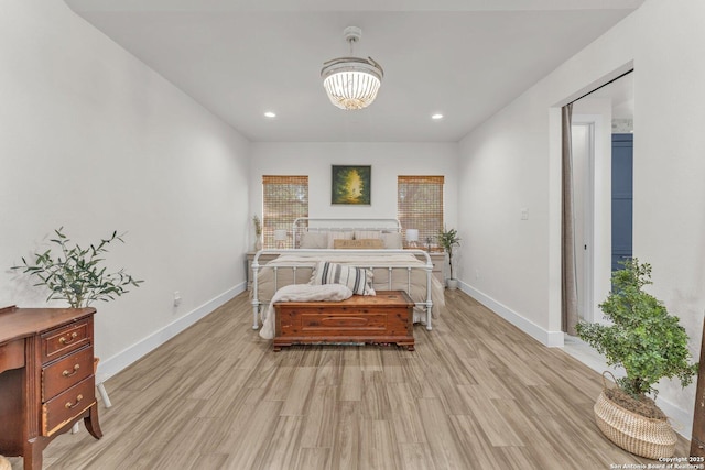 740 Sharp Spgs, Bulverde, TX 78163 - bedroom with light wood-style flooring, baseboards, a chandelier, and recessed lighting
