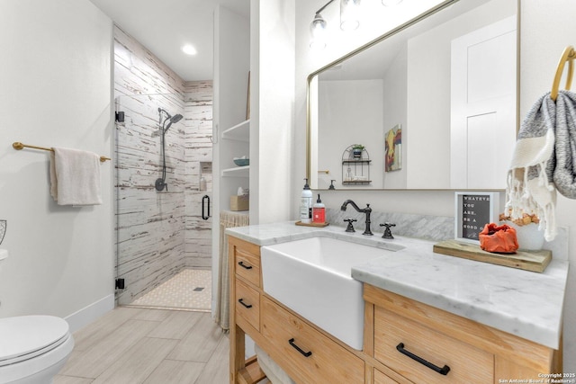 740 Sharp Spgs, Bulverde, TX 78163 - bathroom featuring toilet, vanity, a shower stall, and baseboards