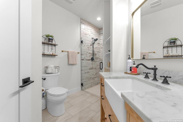 740 Sharp Spgs, Bulverde, TX 78163 - full bathroom featuring vanity, toilet, a shower stall, and baseboards