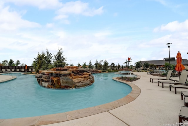 13730 Birch Xing, San Antonio, TX 78252 - community pool featuring a patio