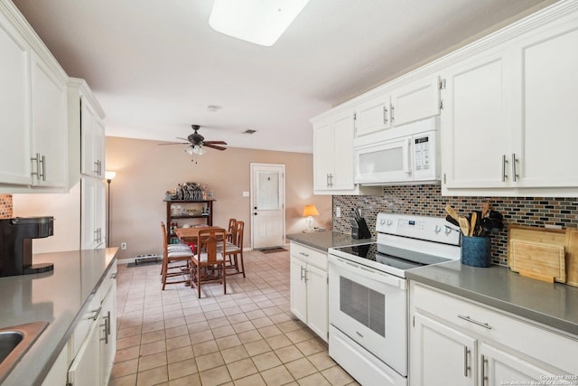 140 Should Bee, Ingram, TX 78025 - kitchen featuring white appliances, backsplash, and white cabinets