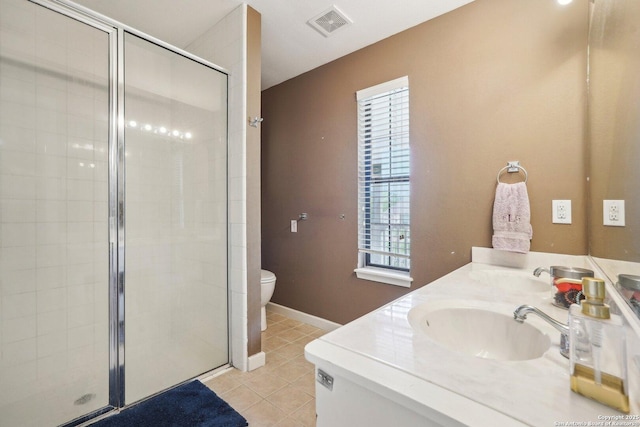 140 Should Bee, Ingram, TX 78025 - bathroom featuring tile patterned floors, a stall shower, double vanity, and toilet