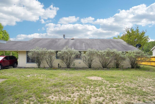 140 Should Bee, Ingram, TX 78025 - back of property with roof with shingles and a carport