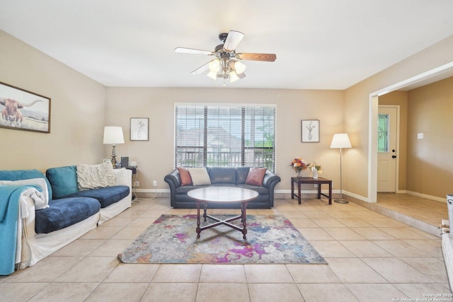 140 Should Bee, Ingram, TX 78025 - living area featuring light tile patterned floors, a ceiling fan, and baseboards