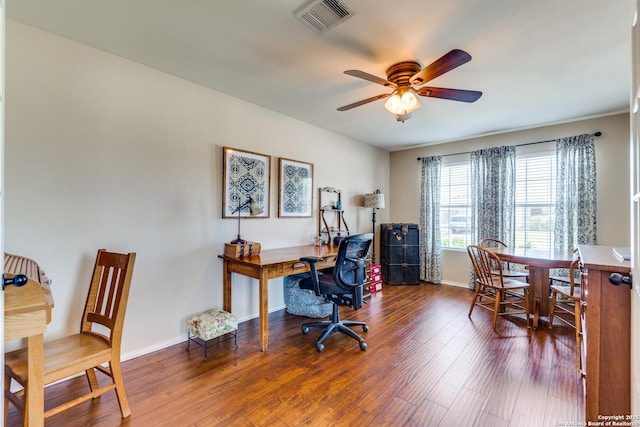 office space with a ceiling fan, baseboards, and hardwood / wood-style floors