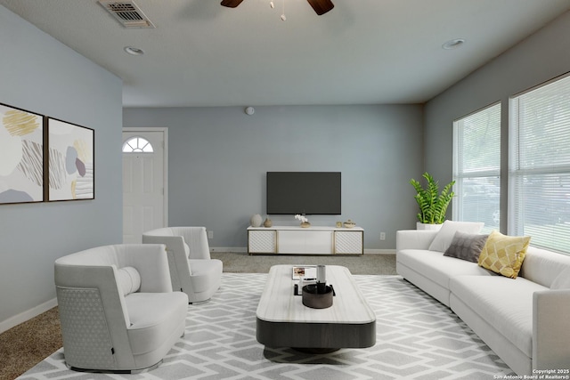 4342 Lehman Dr, Kirby, TX 78219 - carpeted living area with baseboards, ceiling fan, and recessed lighting