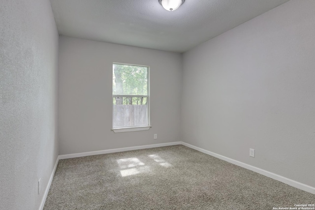 4342 Lehman Dr, Kirby, TX 78219 - carpeted empty room featuring baseboards