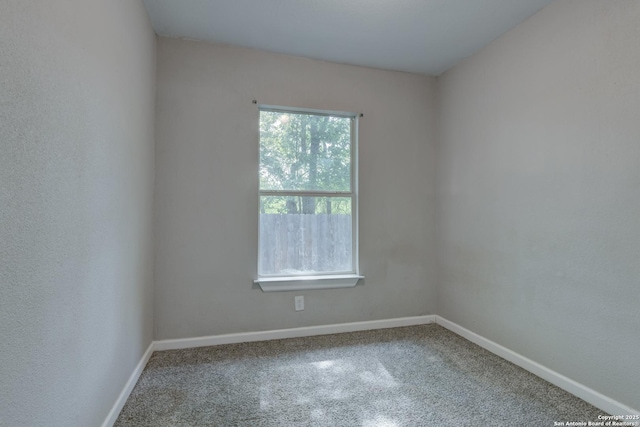 4342 Lehman Dr, Kirby, TX 78219 - unfurnished room featuring carpet floors and baseboards