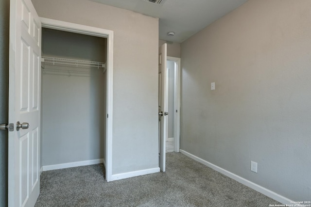 4342 Lehman Dr, Kirby, TX 78219 - unfurnished bedroom featuring carpet flooring, a closet, and baseboards