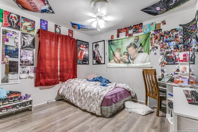 5118 Crusade Dr, San Antonio, TX 78218 - bedroom with wood finished floors and baseboards