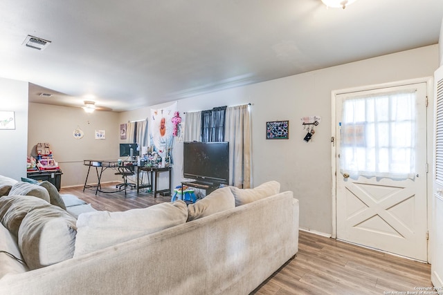 5118 Crusade Dr, San Antonio, TX 78218 - living room with light wood-type flooring and baseboards