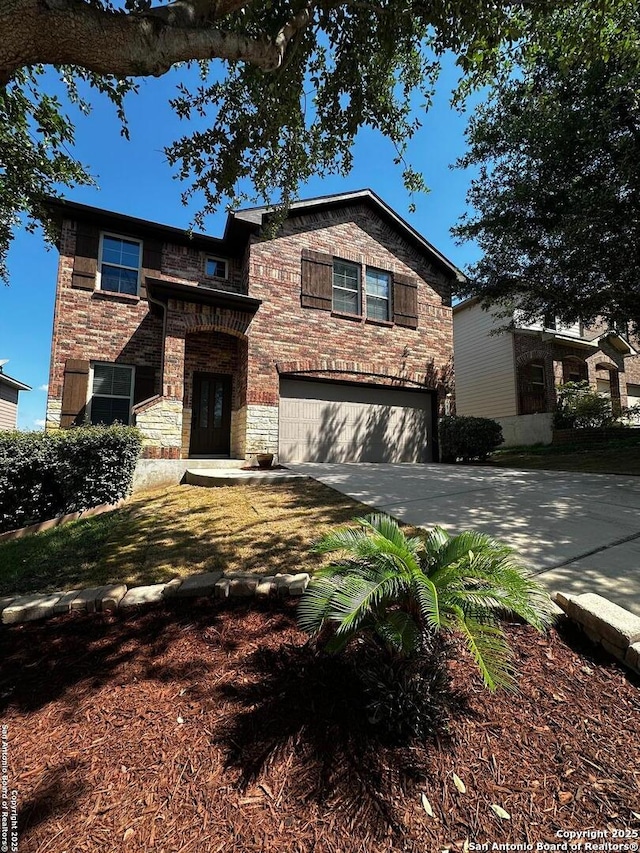6635 Cibola Frst, San Antonio, TX 78233 - traditional home featuring an attached garage, driveway, and brick siding
