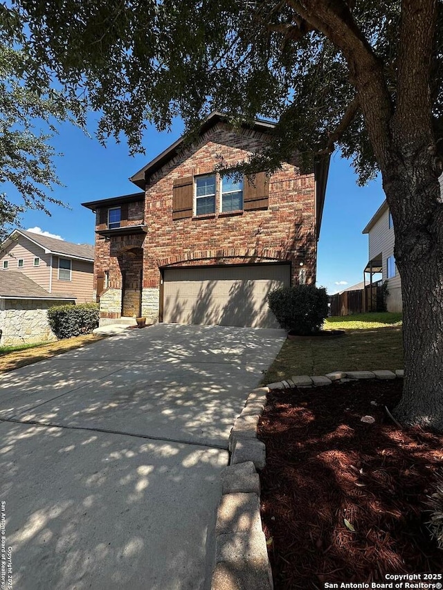 6635 Cibola Frst, San Antonio, TX 78233 - traditional home with stone siding, an attached garage, driveway, and fence