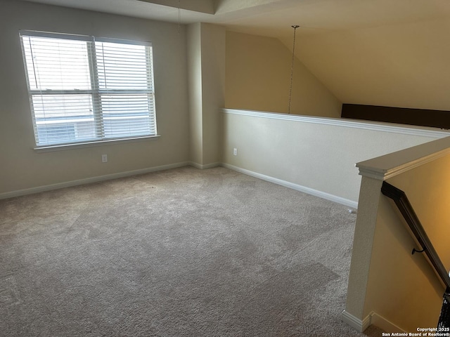 6635 Cibola Frst, San Antonio, TX 78233 - carpeted empty room featuring vaulted ceiling and baseboards