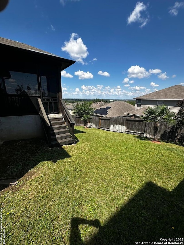 6635 Cibola Frst, San Antonio, TX 78233 - view of yard with stairs and a sunroom