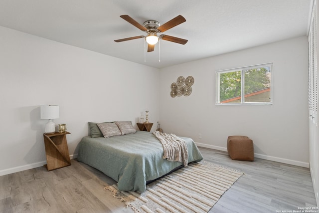 3115 Bluefield, San Antonio, TX 78230 - bedroom featuring wood finished floors, baseboards, and a ceiling fan